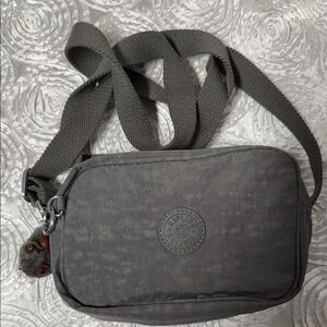 Kipling Silen Charcoal Gray Crossbody Bag with Monkey Keychain